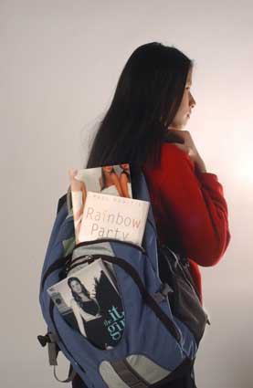 a teen's backpack stuffed with racy titles developed for this market.  media credit: newsday / tony jerome.